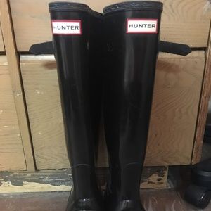 Tall black Hunter boots.
